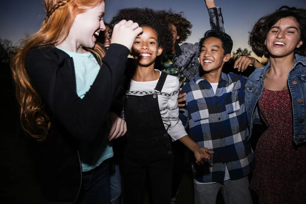 invisalign teen patients having fun in field